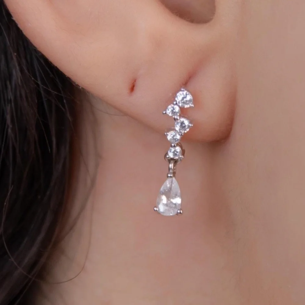 Zara 925 sterling silver dangle earrings with pear sharped CZ